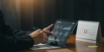 Thoughtful person reviewing 2026 disability insurance benefit changes on a tablet